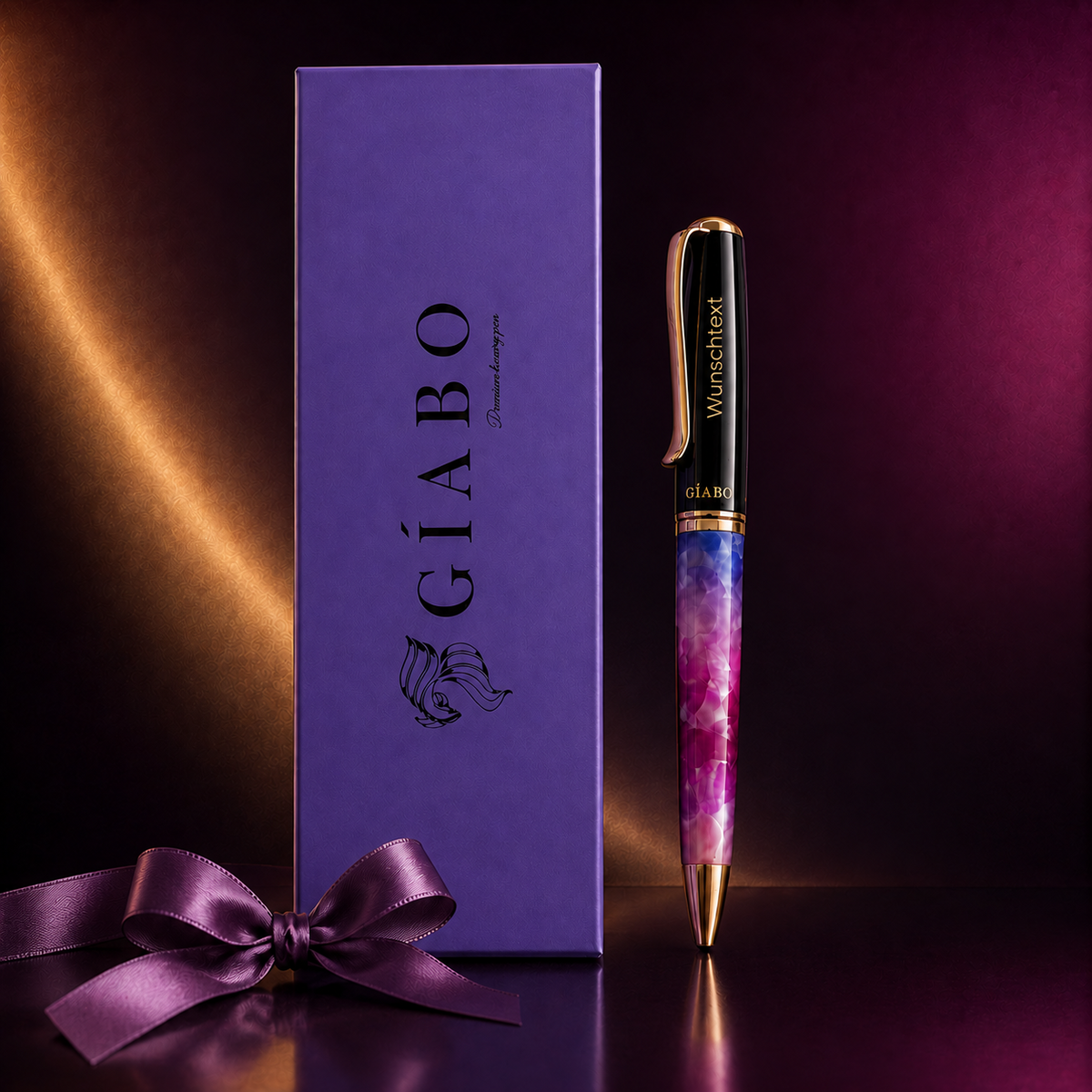 Gíabo Dreamer Rosa/Blau Kugelschreiber mit Gravur neben lila Geschenkbox